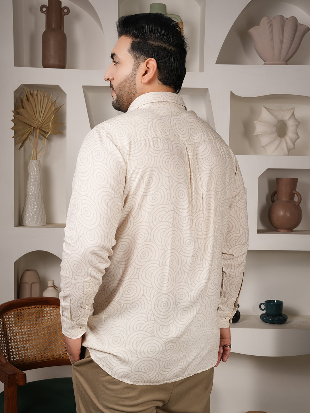 Men wearing off-white printed shirt made with 100 percent viscose fabric
