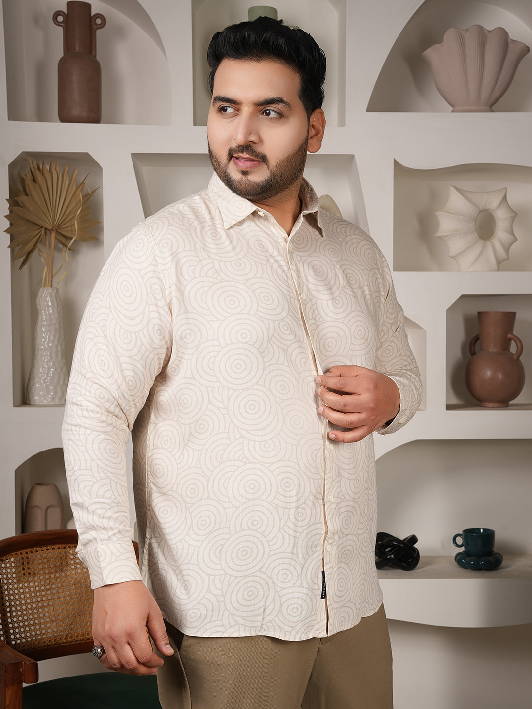 Men wearing off-white printed shirt made with 100 percent viscose fabric